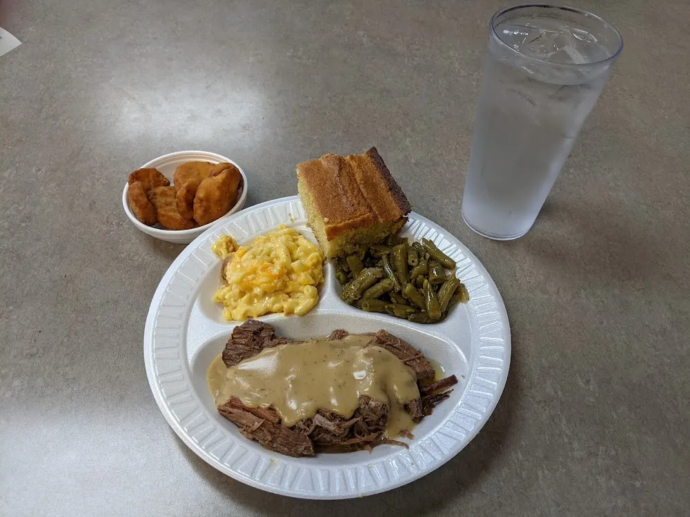 Roast Beef and Gravy with Green Beans Macaroni and Cheese and Fried Squash